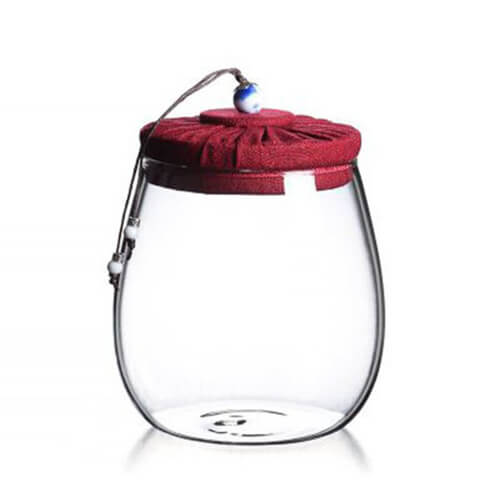 glass storage jar with cloth lid